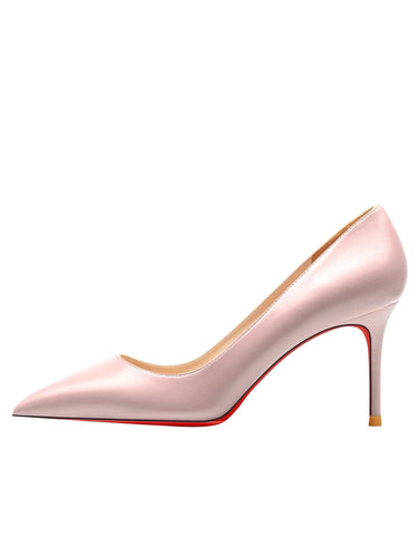 Luxury pink matte high heeled pumps with red sole against a white background.
